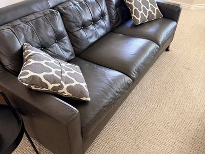 Black couch and ottoman