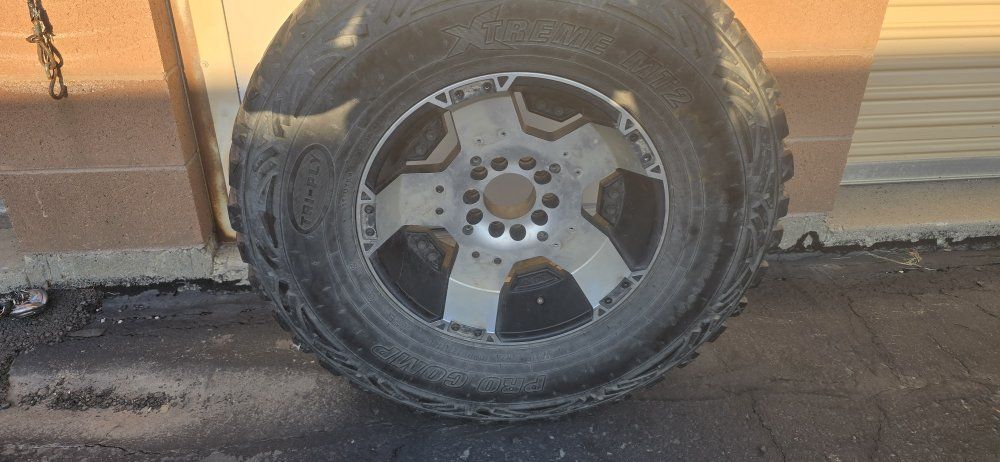 Set of 4 315/70/R17 5x5.25 or 5x5.5 lug pattern Pro Comp Xtreme MT2 Mud Terrain Tire with Aftermarket Alloy Wheel