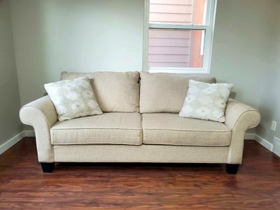 3-seat Beige Couch / Sofa with Throw Pillows - Excellent Condition