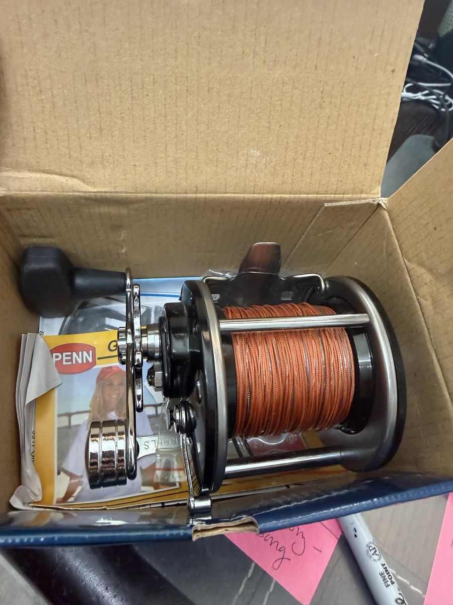 NEW PENN 209M LEVEL WIND FISHING  REEL (RETAILS: $94.99)