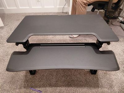 Adjustable monitor riser for desk