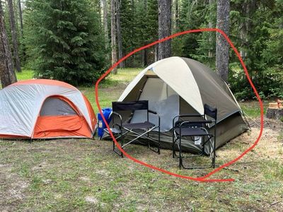 Coleman “4” man dome tent with fly and stakes.