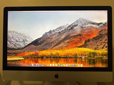 Apple iMac Retina 5K, 27-inch, Late 2015 in good working condition.