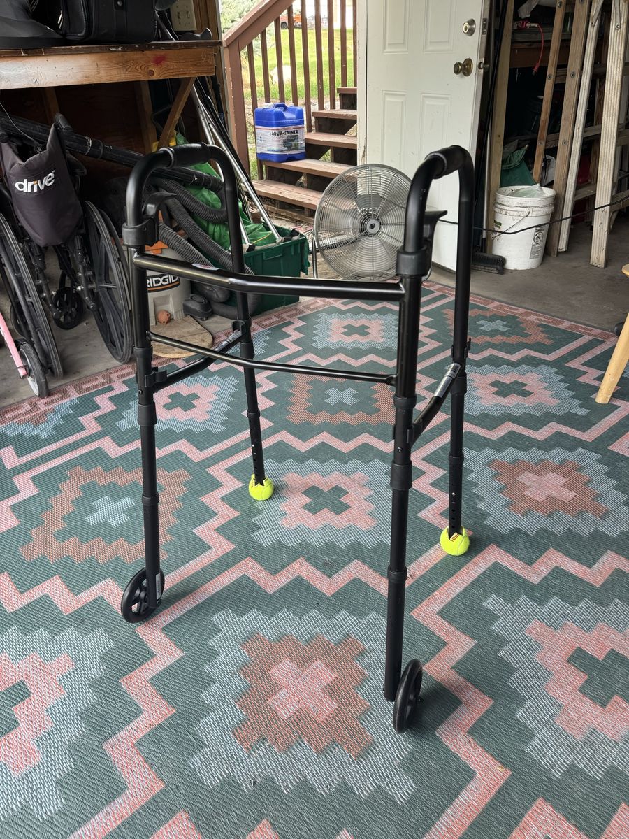 Black Folding Medical Walker with Front Wheels and Tennis Balls