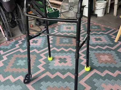 Black Folding Medical Walker with Front Wheels and Tennis Balls