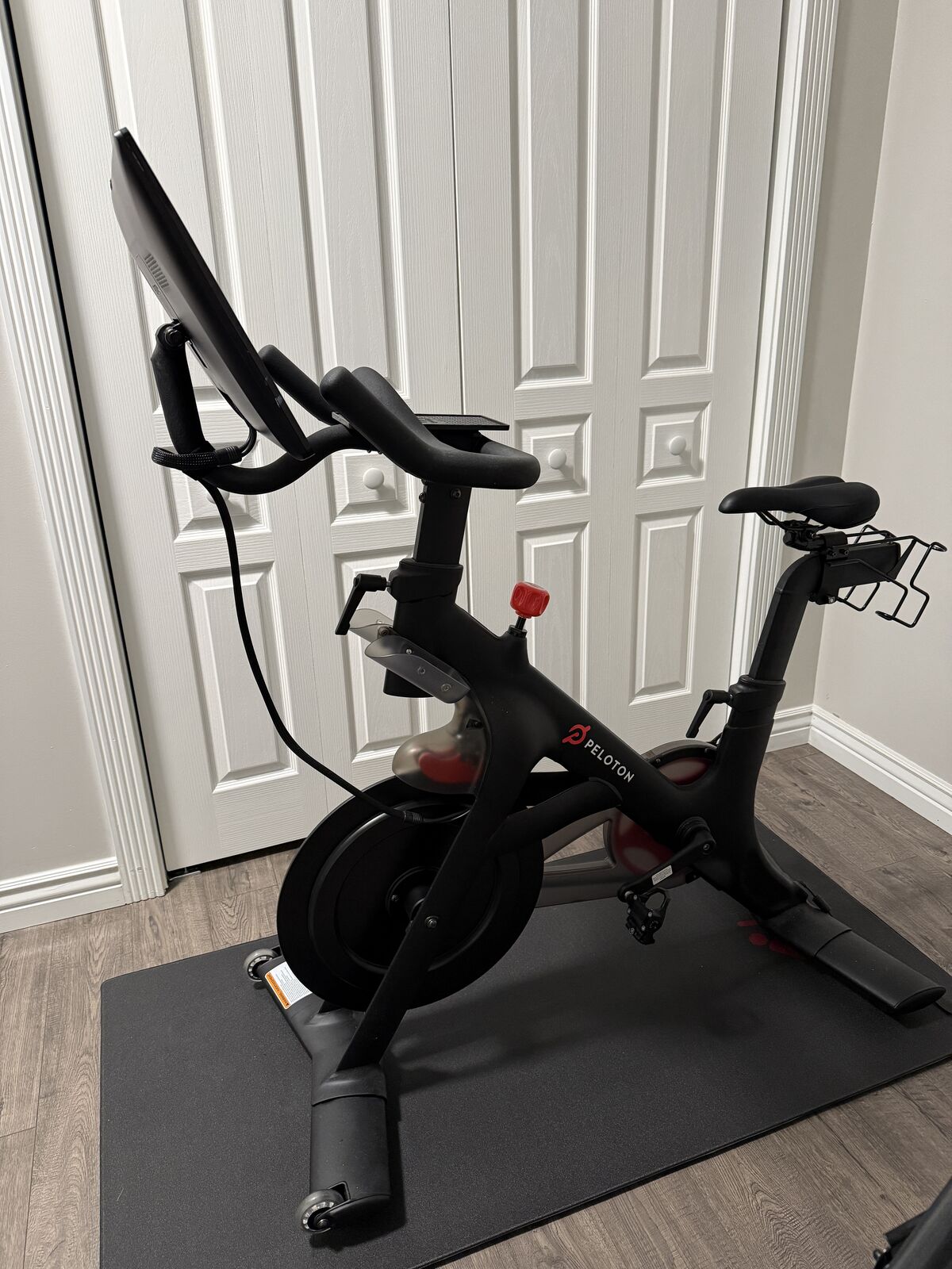Peloton Bike w/ Womens size 7 and Mens Size 10 shoes