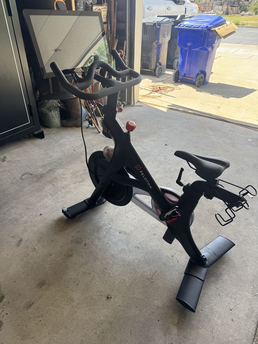 Peloton Bike Exercise Bike - Black with Red Pedals & Digital Screen