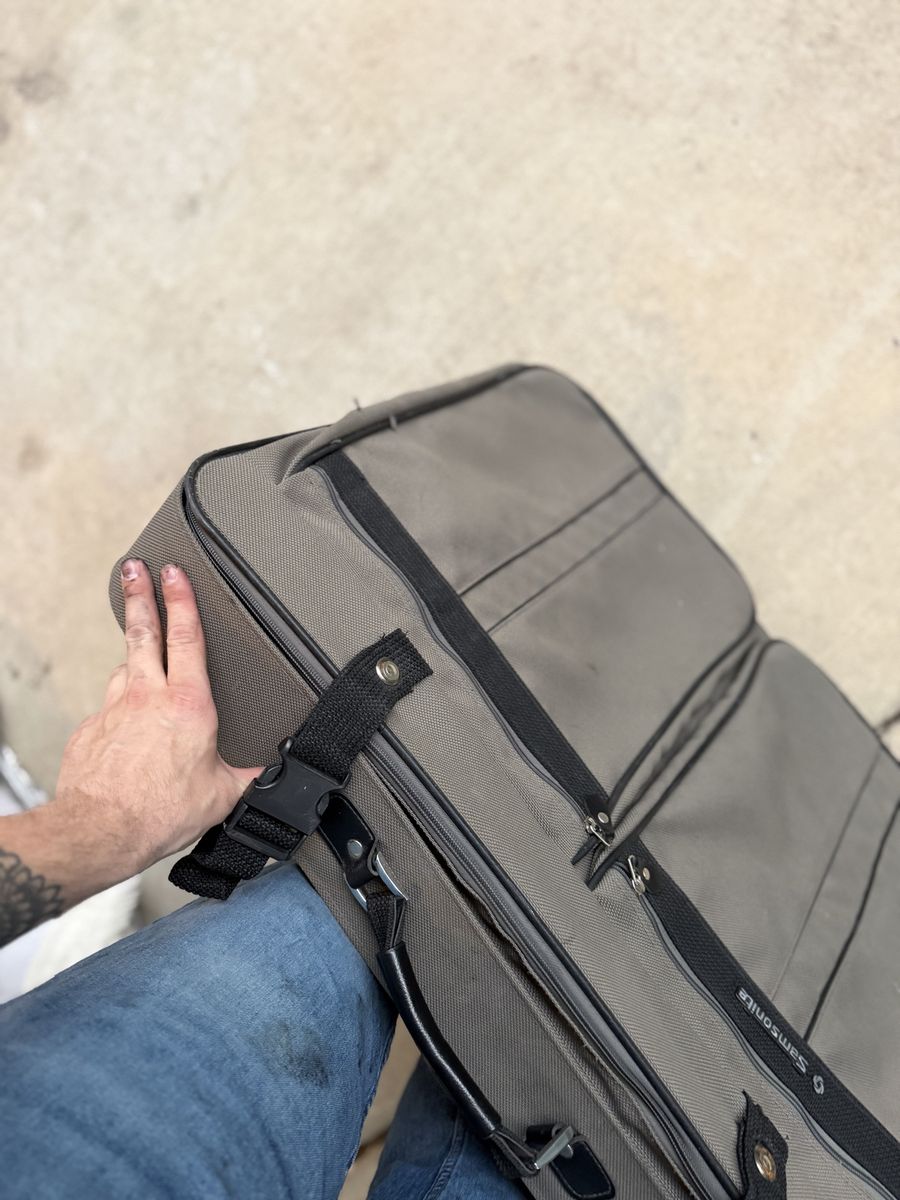 Samsonite Expandable Gray Garment Bag with Wheels and Multiple Pockets