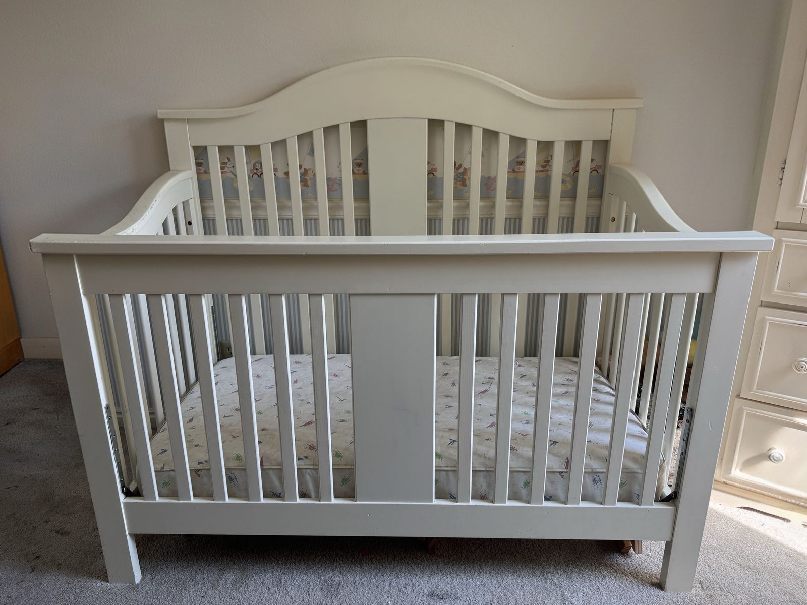 Cream convertible baby crib