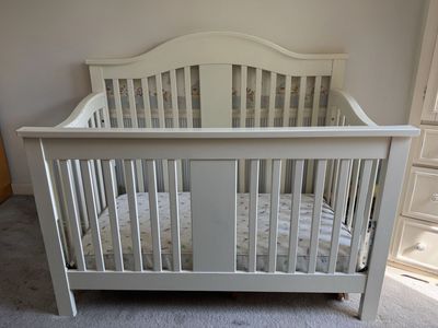 Cream convertible baby crib