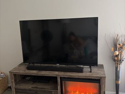 TV stand with artificial fireplace and drawer