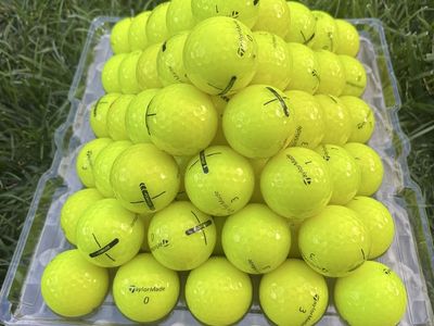 12 - TaylorMade Neon Yellow Balls
