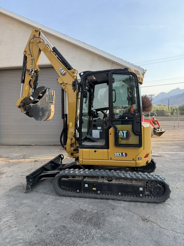 Need Serious Digging Power in a Compact Package? CAT 303.5 Mini Excavator Rental