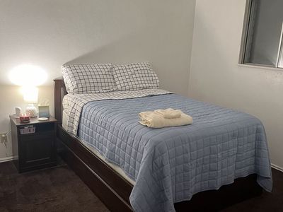 Skorva IKEA bed frame used, mattress, box spring, and side table