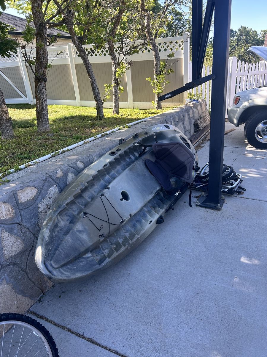Two person kayak with extra fishing stuff