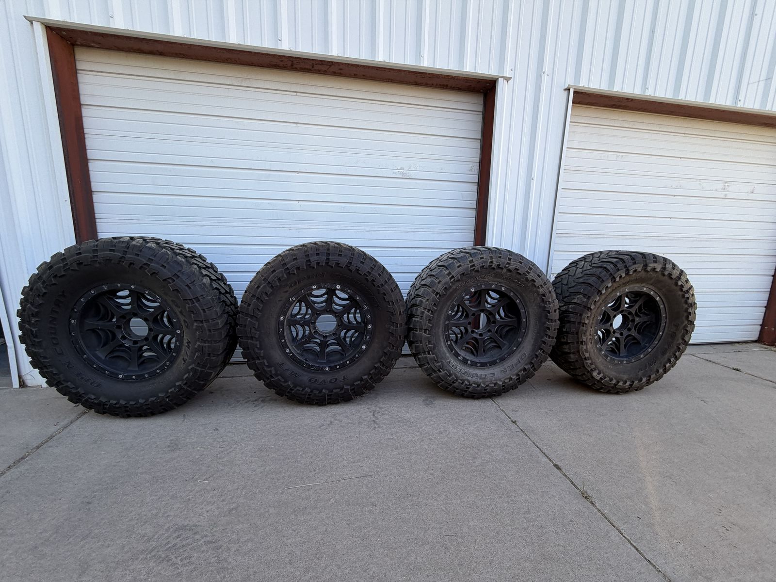 40x15.50x20 Toyo M/Ts on 20x9 Jesse James Black Wheels 8x6.5 $1200/Trade