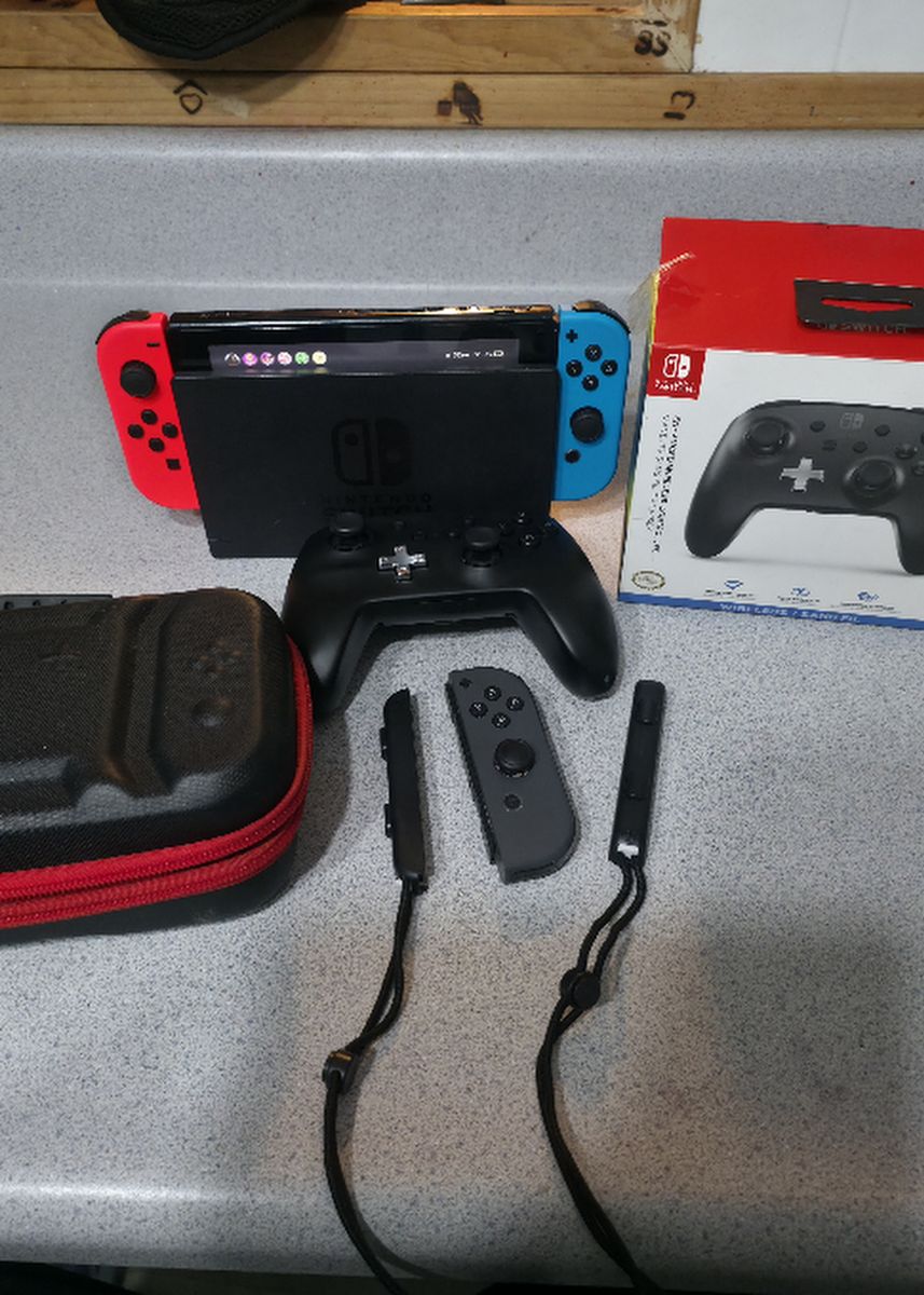Nintendo Switch w/ NEW Red & Blue Joy-Cons & MORE