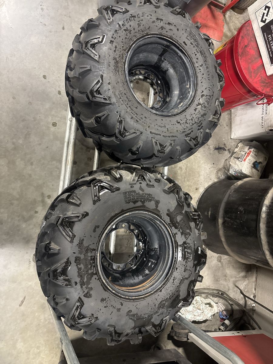 Rear four wheeler wheels and tires. 24x11-10 4x156 lug pattern