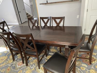 Great condition 94" x30" table with 8 matching chairs
