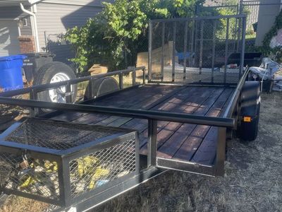 Utility Trailer with Ramp Gate and Wood Deck