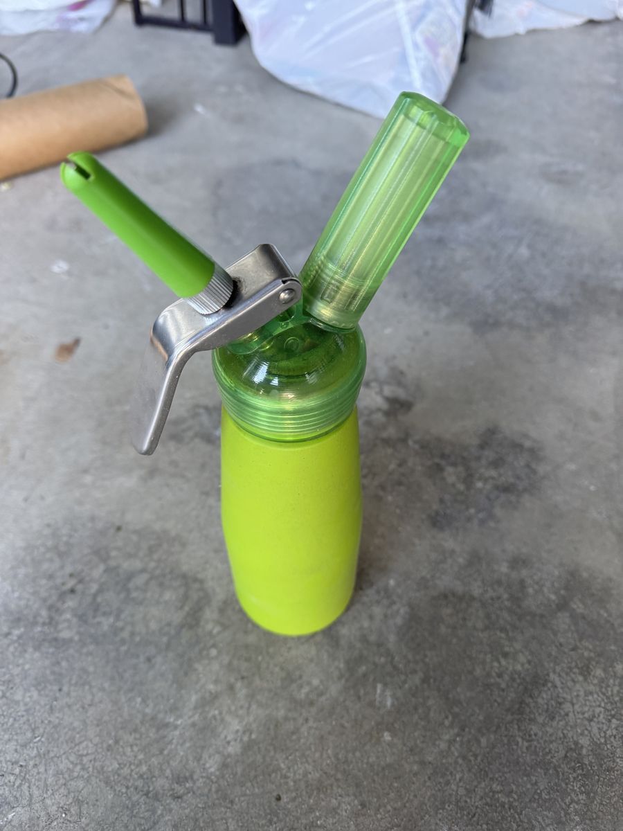 Whipped cream dispenser