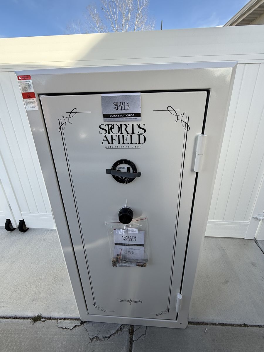 Brand new 32 gun Sports Afield safe