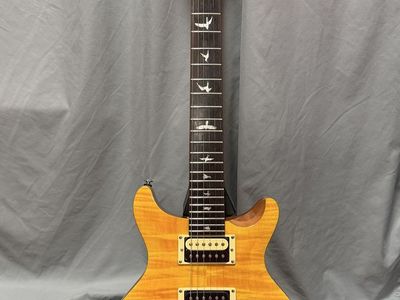 Used PRS SE Santana Electric Guitar with Tremolo Bridge - Yellow Finish
