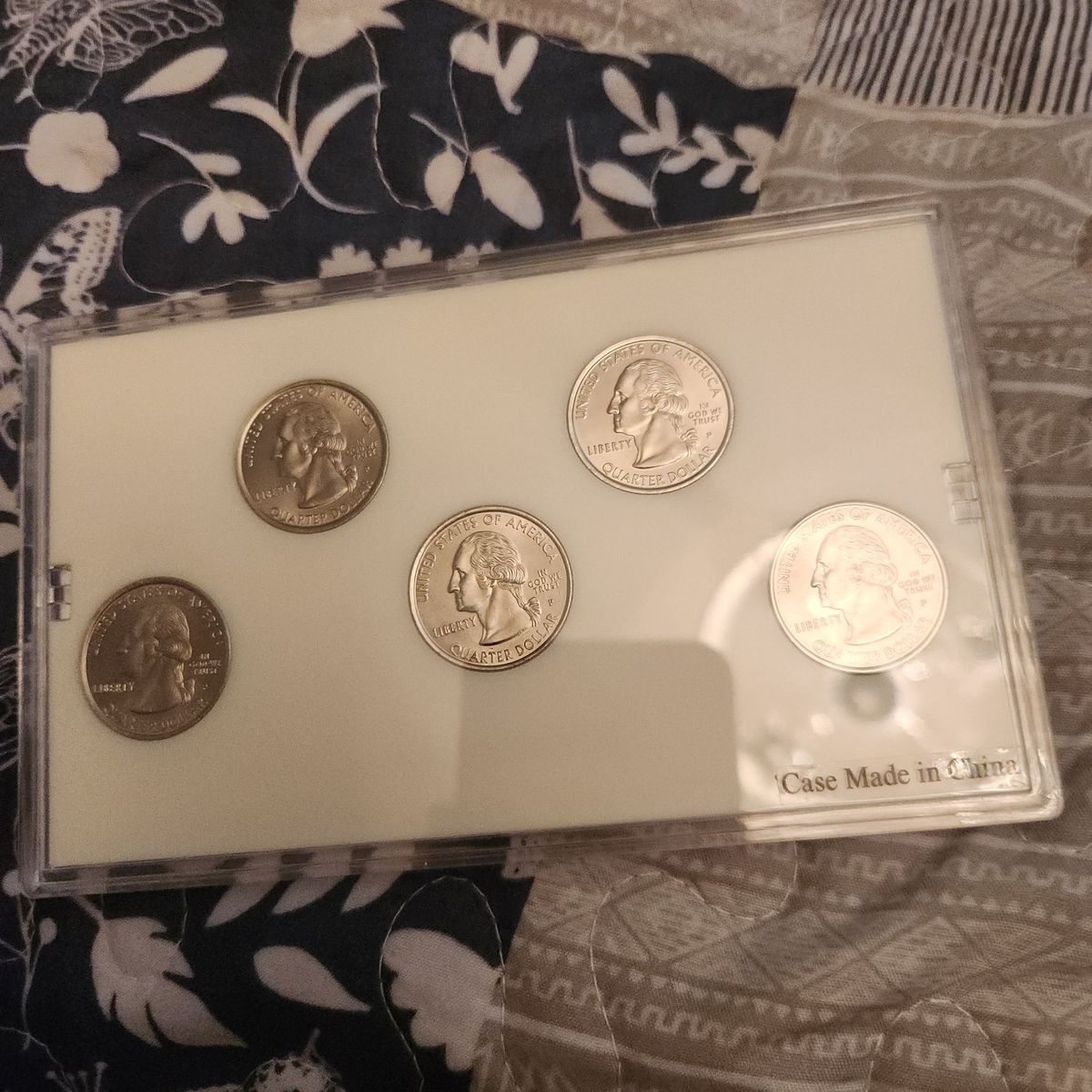 1999platium coated state quarters uncirclated
