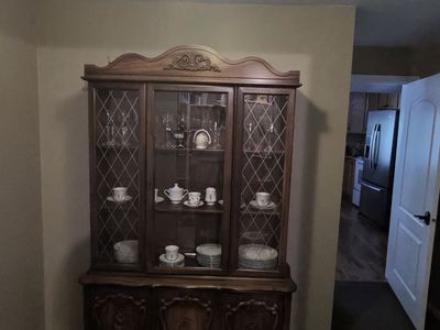 Vintage Dark Wood China Cabinet/Hutch - Glass Doors, Intricate Carvings, 2-Piece
