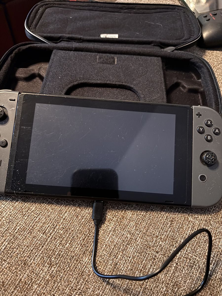 Nice Nintendo Switch In Case With Power Cord