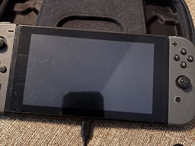 Nice Nintendo Switch In Case With Power Cord