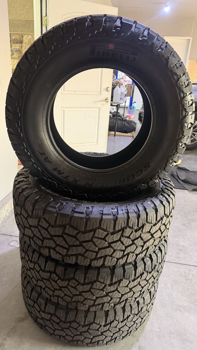 Brand new 275/70R18 Pirelli Scorpion XTM AT tires (set of 4).