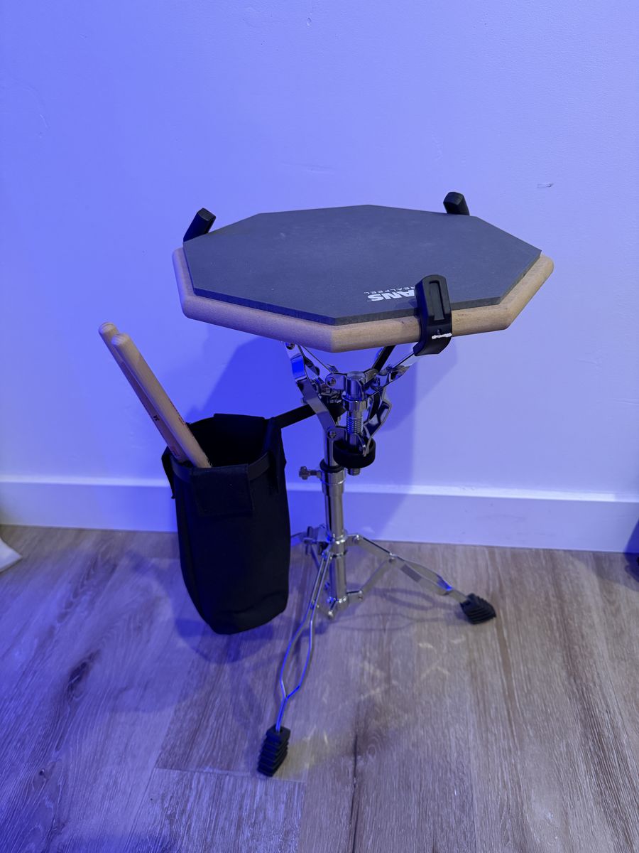 Evans RealFeel - Drummer Practice Pad - 12 inch. Stand and vic firth American Classic 5A drum sticks.