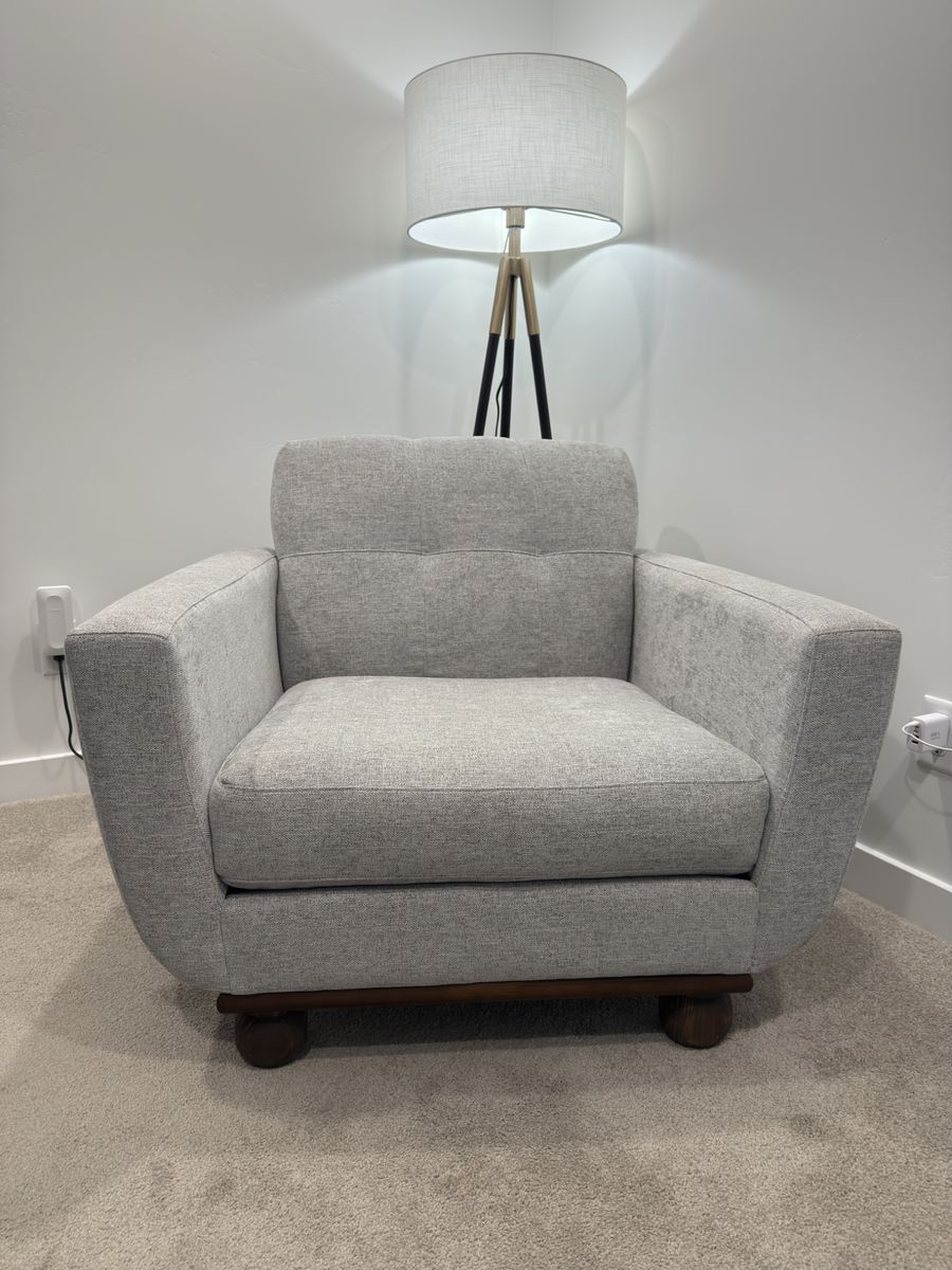 Light Grey Upholstered Armchair with Wood Base and Round Feet - Excellent Condition