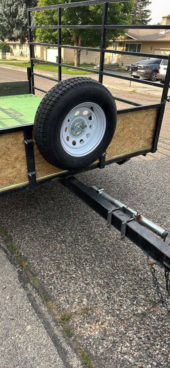 Utility trailer side load