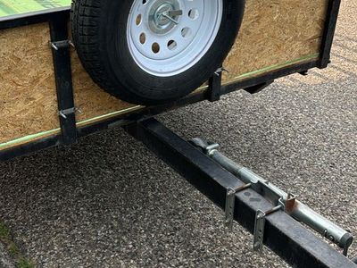 Utility trailer side load