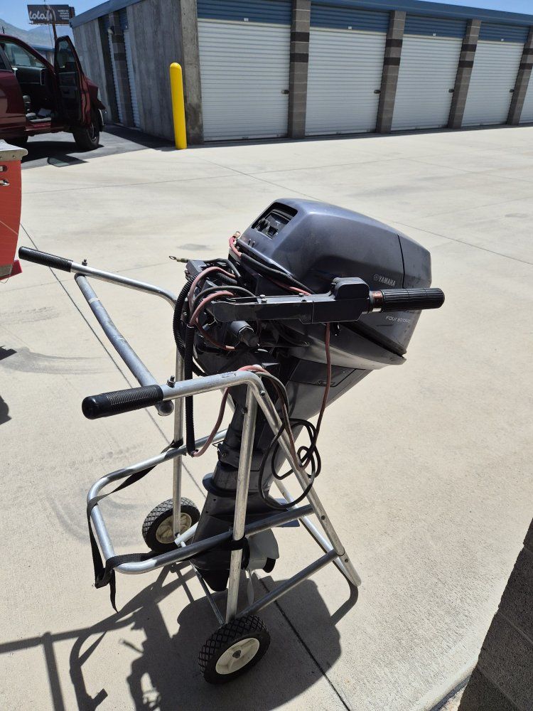 Yamaha Four Stroke Outboard 9.9hp long shaft Boat Motor  needs dont know what ran a year ago now does not stay running