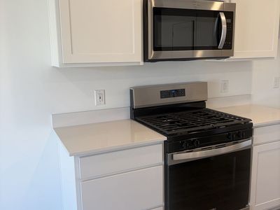 NEW Whirlpool Gas Range + OTR Microwave