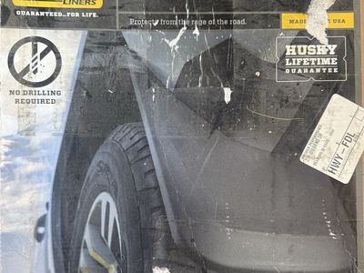 2017 Ford F-150, Husky Liners custom-molded mud guards
