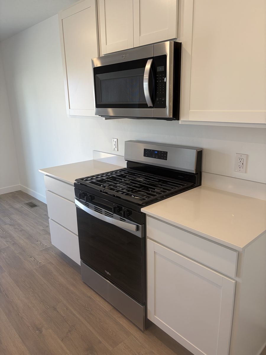 New Whirlpool Gas Range + OTR Microwave