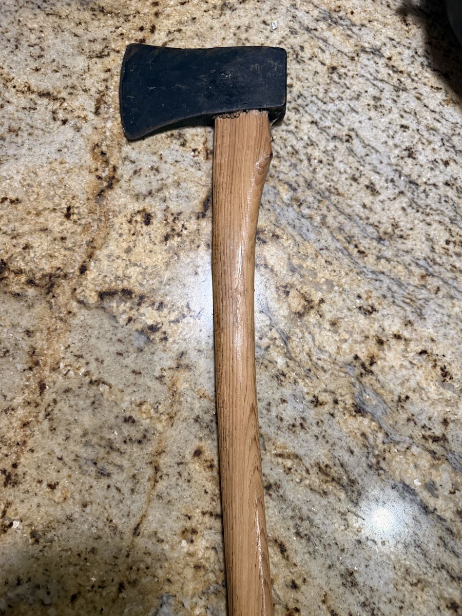 Axe with wood handle