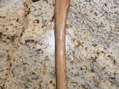 Axe with wood handle