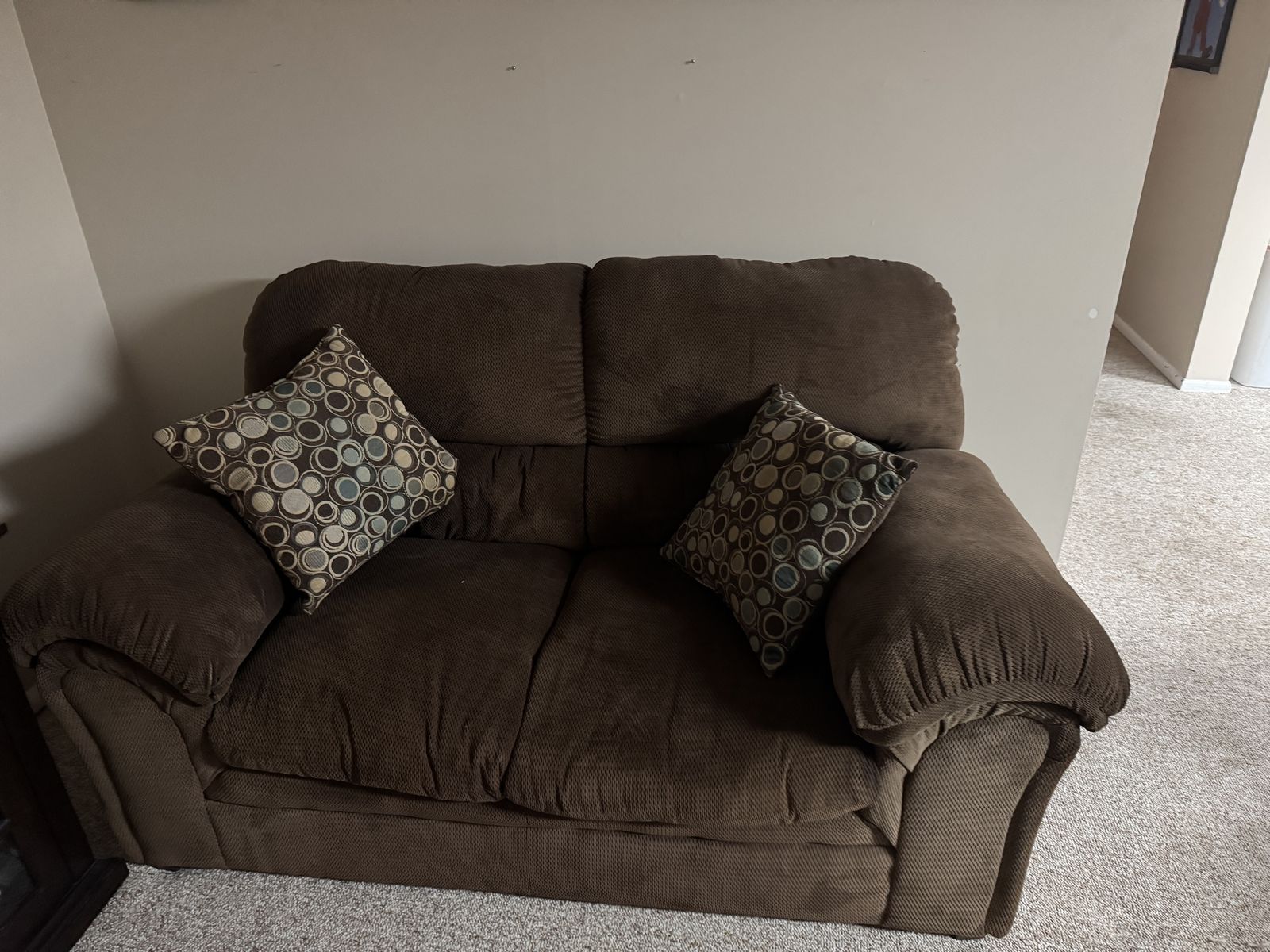 Brown love seat
