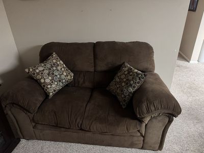 Brown love seat