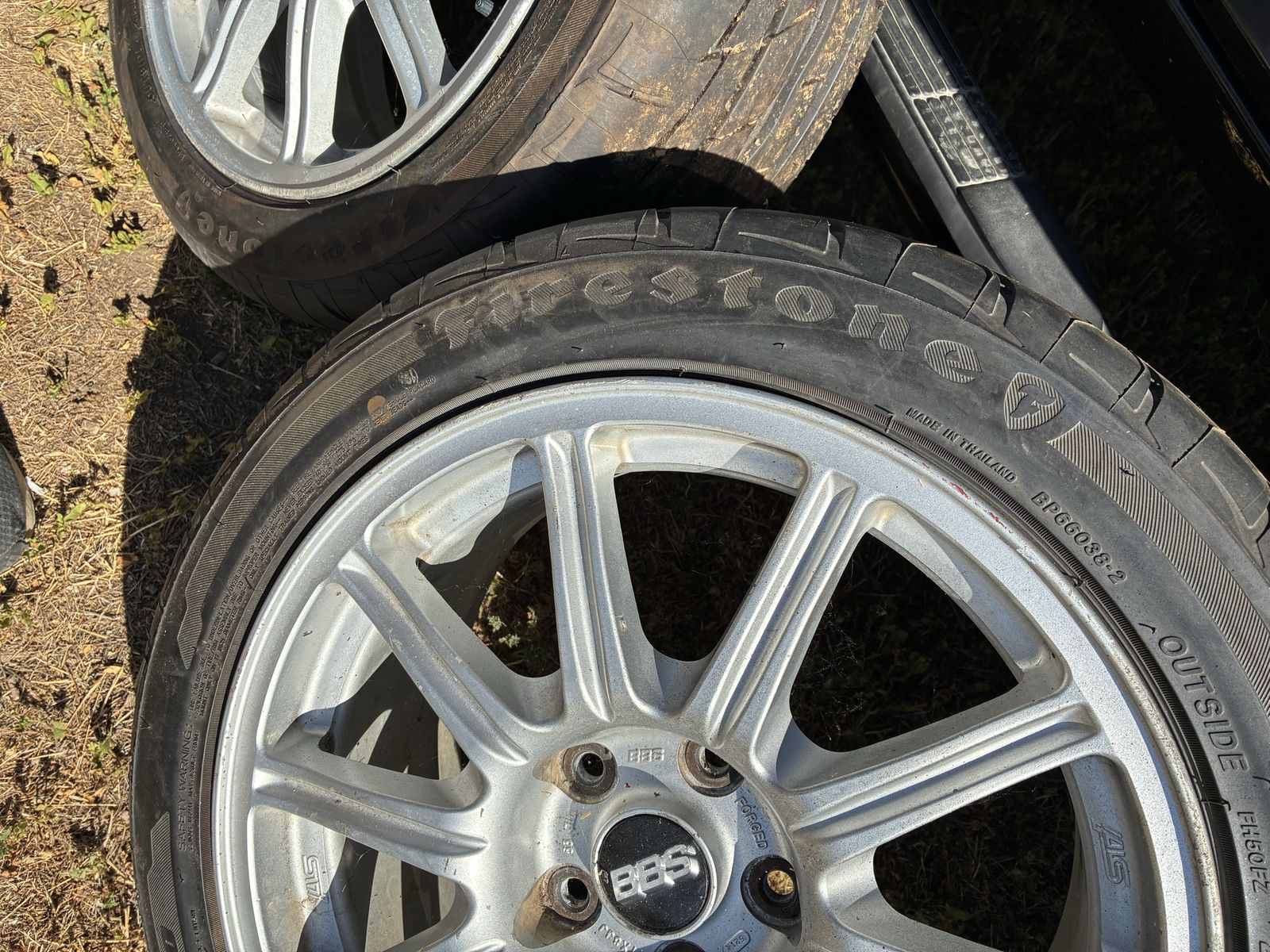 Subaru OEM STI wheels with new Firestone tires