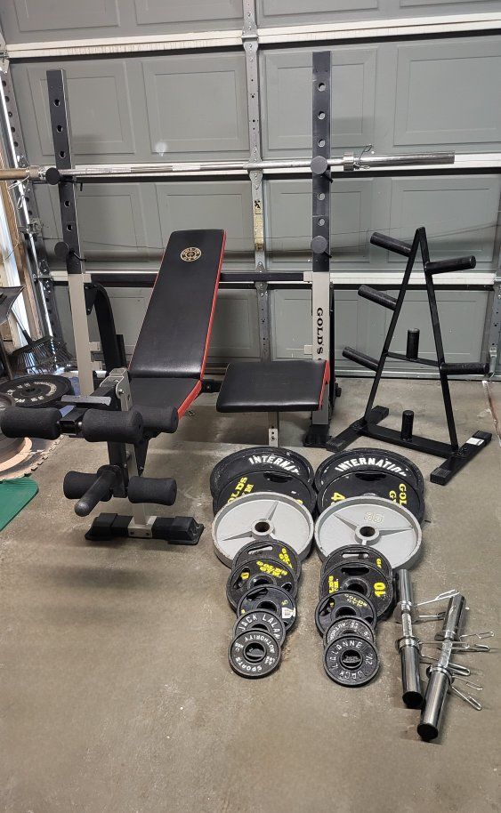 Bench and 310 pounds of weights