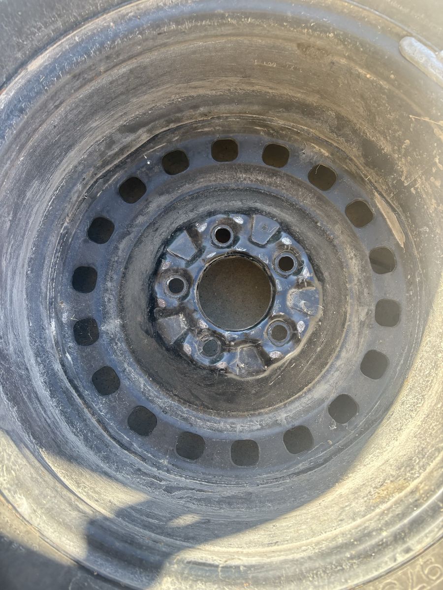 16” steel Ford Crown Victoria wheel.