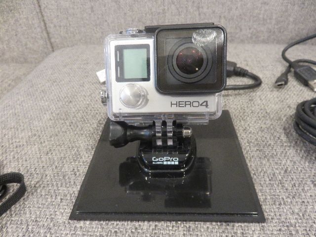 NEVER USED GO PRO HERO 4 CAMERA, QUICKPOD MOUNTING STICK, SPARE BATTERY AND MEMORY CARDS, AND ALL ACCESSORIES AND PAPERWORK