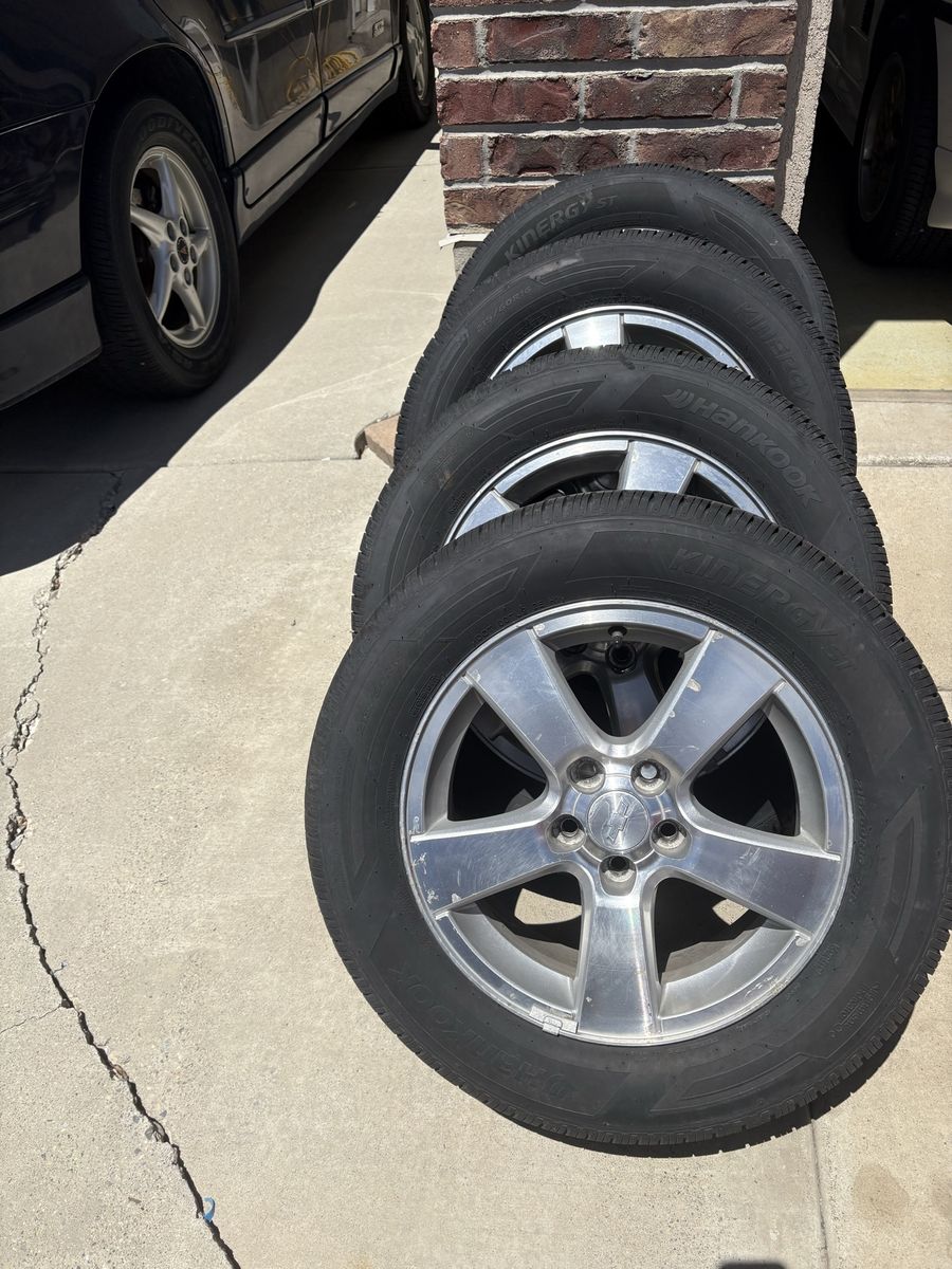Chevy Cruze wheels and almost new Hankook tires.