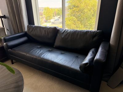 Luxurious Black Leather Sofa - Tufted Details, Modern Design, Excellent Condition